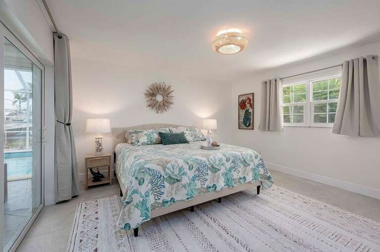 Main Bedroom with King Bed and Patio Access