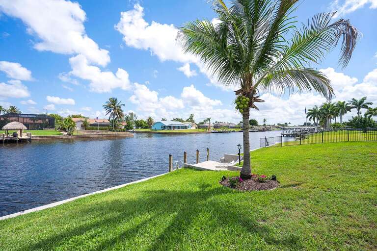 Backyard with Oversized Wide Direct Gulf Access Canal