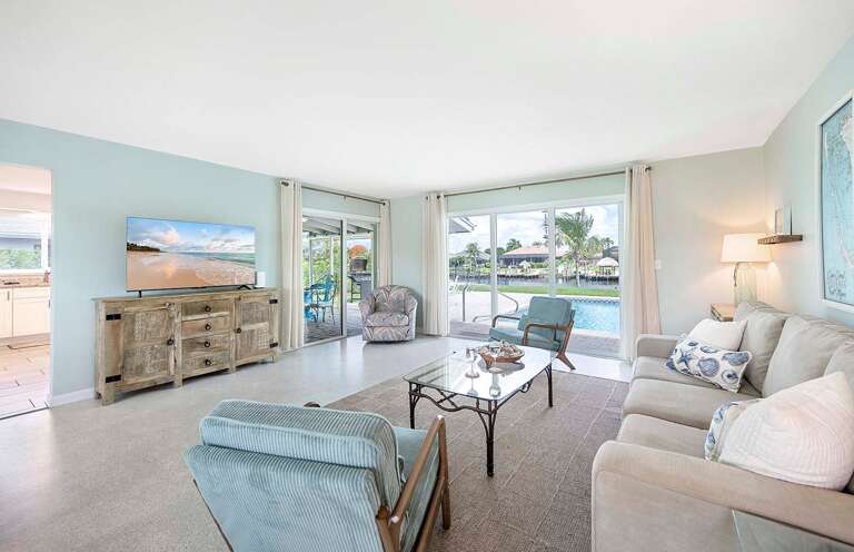 Bright and Open Living Space with Views of the Pool
