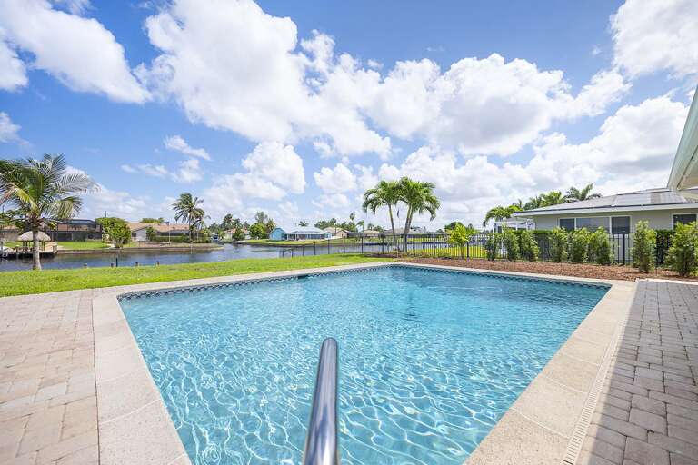 Take Dip and Enjoy this Oversized Pool with Amazing Canal Views