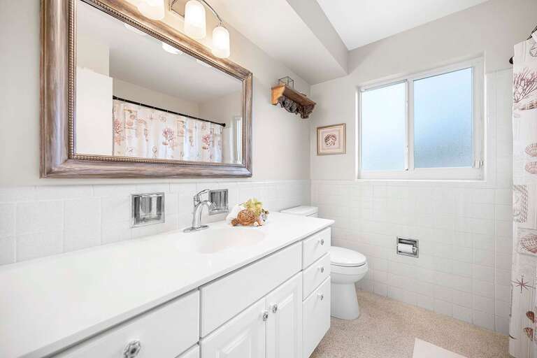 Hallway Bathroom with Shower Tub Combo and Sink