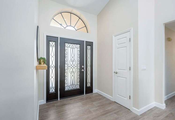 Beautiful Glass Entrace Door with Beautiful View to Pool and Living Room