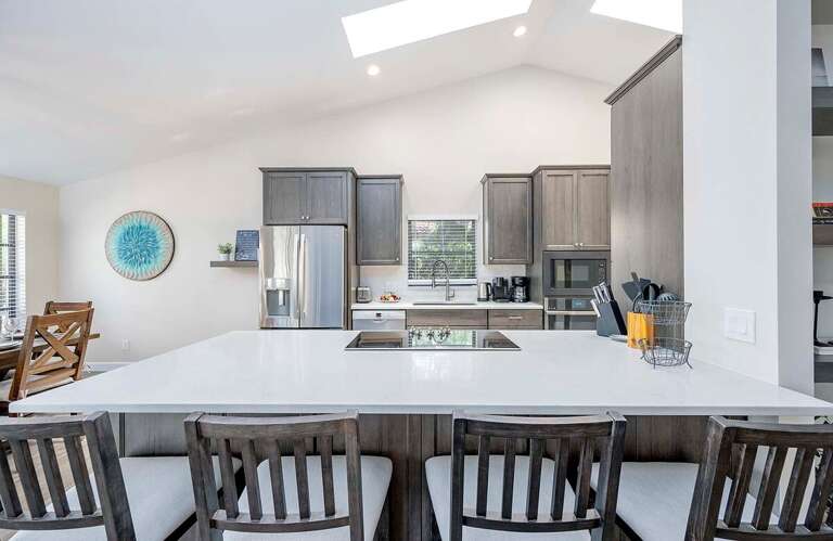 Open Kitchen with Large Kitchen Island additional Seating for 4