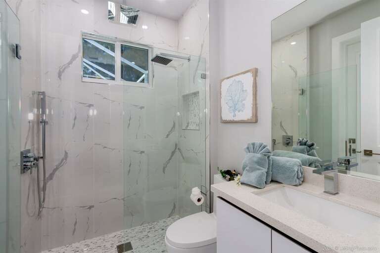 En-suite Bathroom for Bedroom 3 with Access to the Patio/Pool
