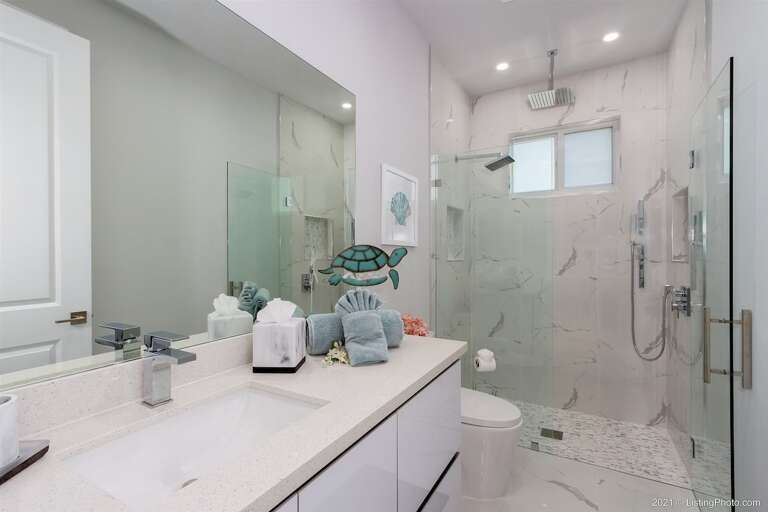 Guest Bathroom that is Shared by the Queen and Twin Bedroom