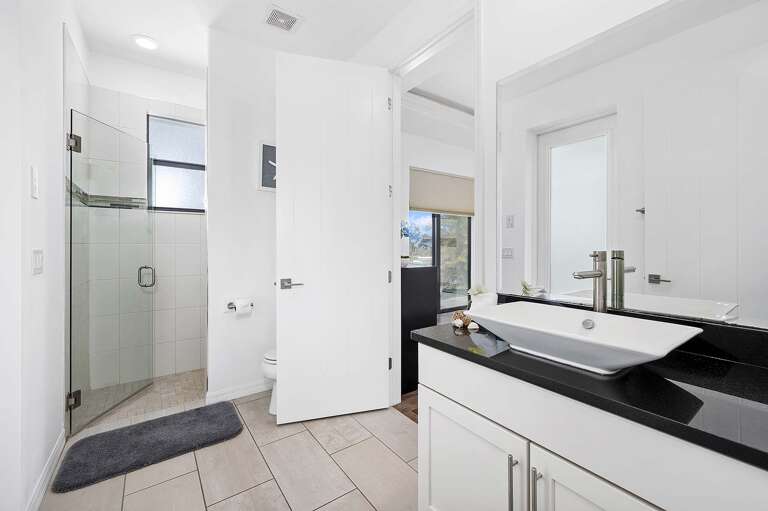 Guest Bathroom with En-Suite Bathroom featuring Walk In Shower