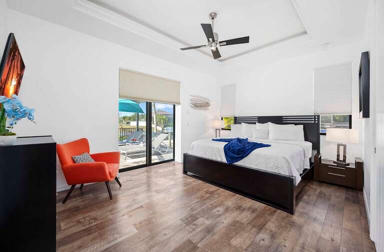 Guest Bedroom with King Bed  and Access to Lanai