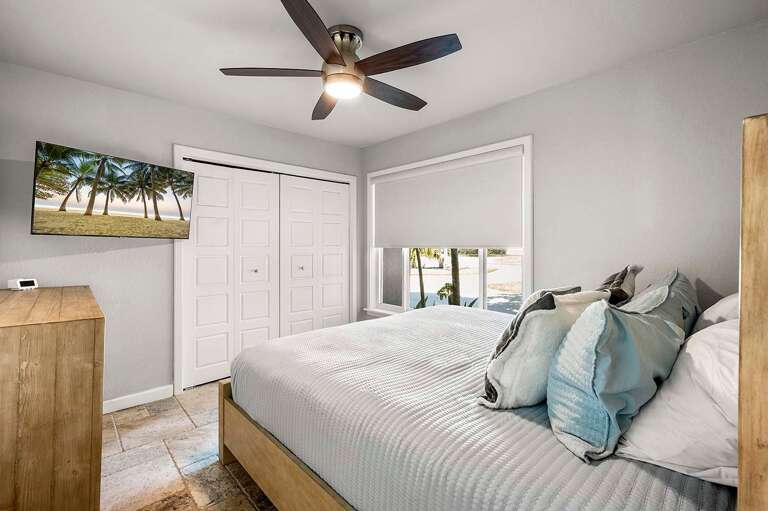 King Guest Bedroom with Garden and Entrance View