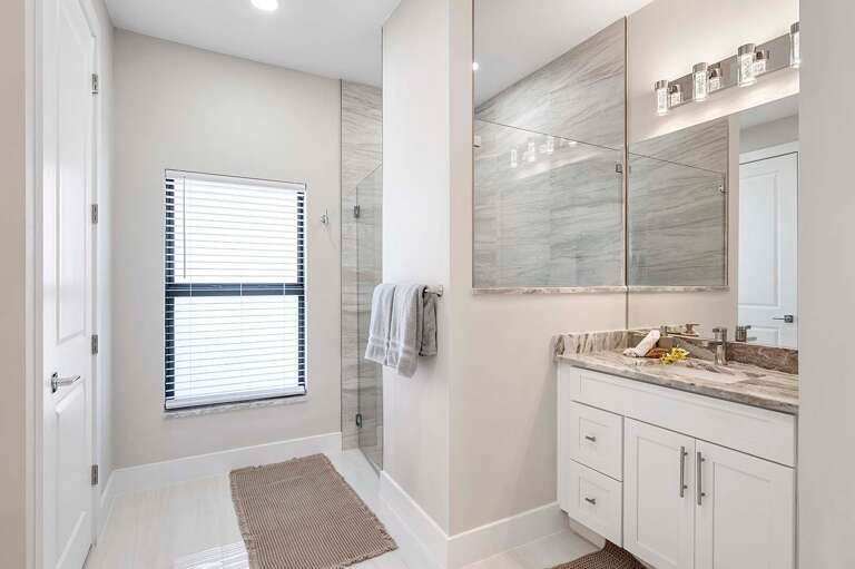 En-Suite Main Bathroom with Shower and His and Hers Sinks