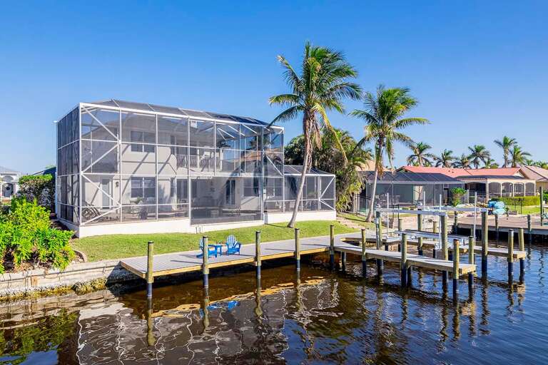 Backdrop of Villa Eight Lakes with Dock and Boat Lift