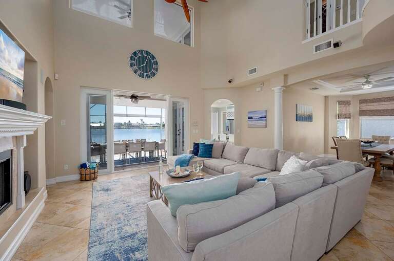 Living Room With Large L-Shape Couch and Smart TV