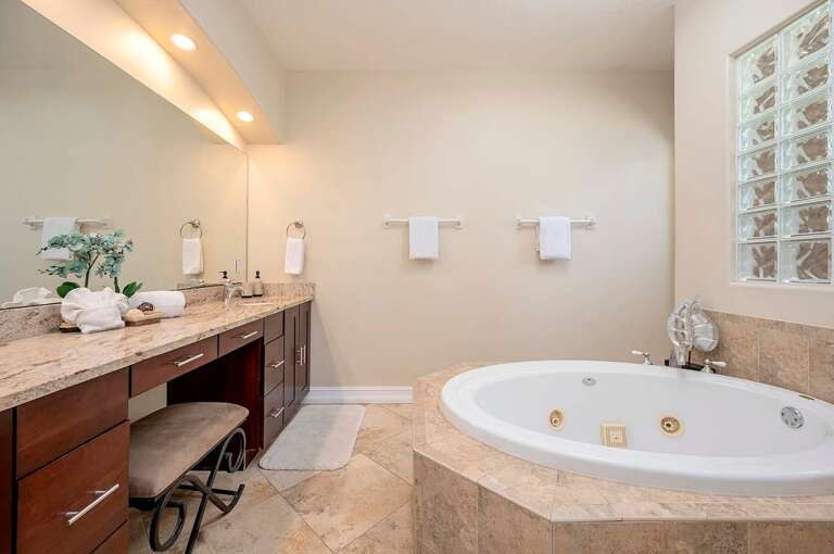 Main Bathroom En-Suite with Walk Through Shower and Garden Tub