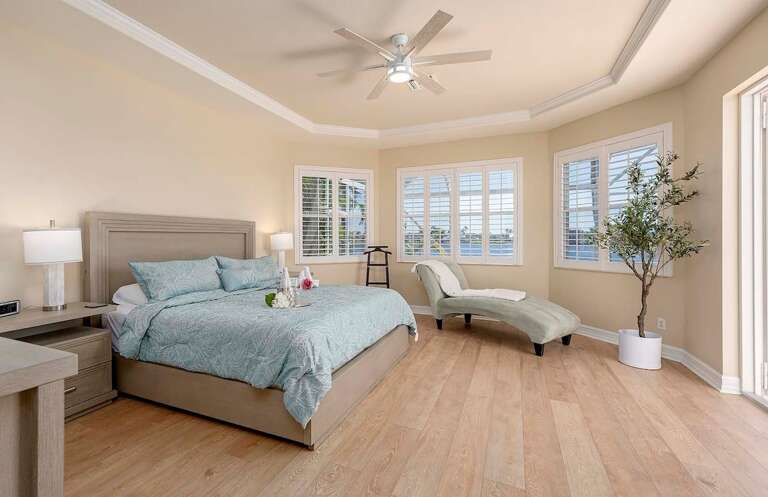 Main King Bedroom With Patio and Pool Views