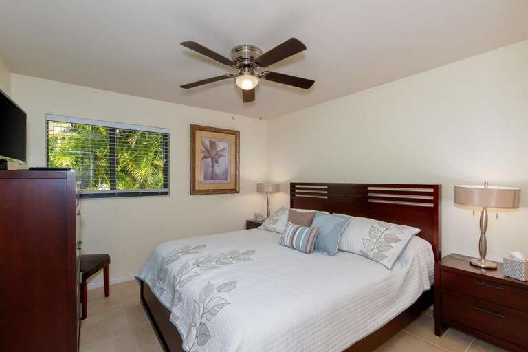 Guest bedroom 1 with a king size bed, dresser and two night stands