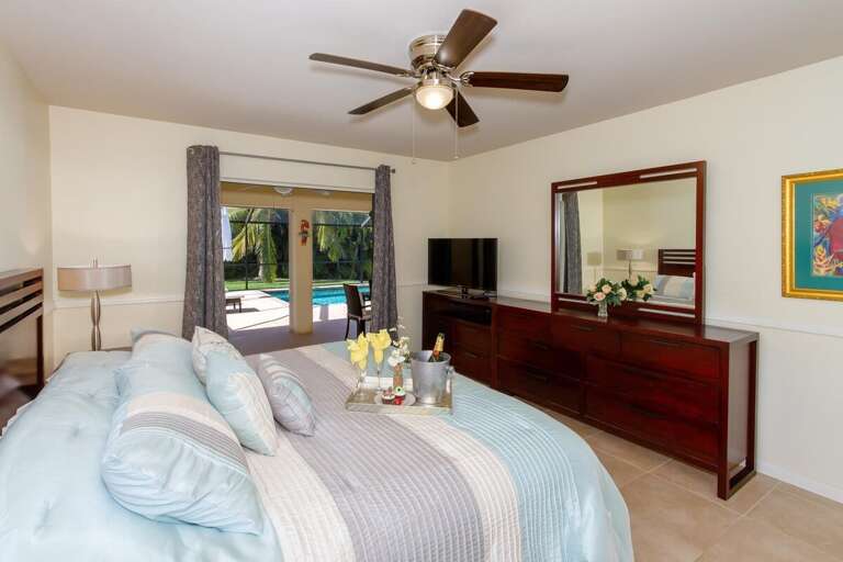 The master bedroom has direct access to the lanai