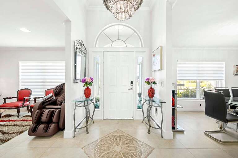 Front Entrance Foyer with Family Room to the Left and Formal Dining Area to the Right