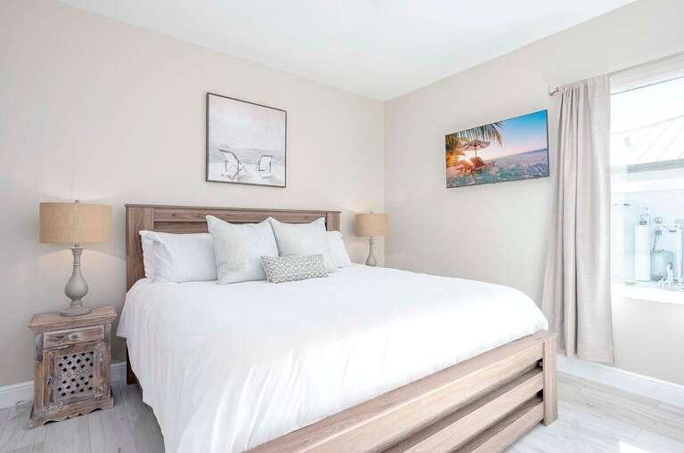 Guest Bedroom with King Bed and Garden View
