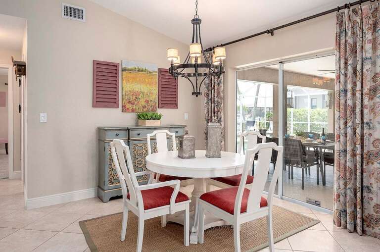 Dining Area with Pool and Patio View