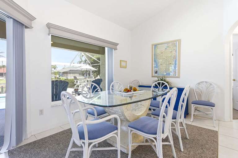 Dining Area with View of the Lanai and Pool