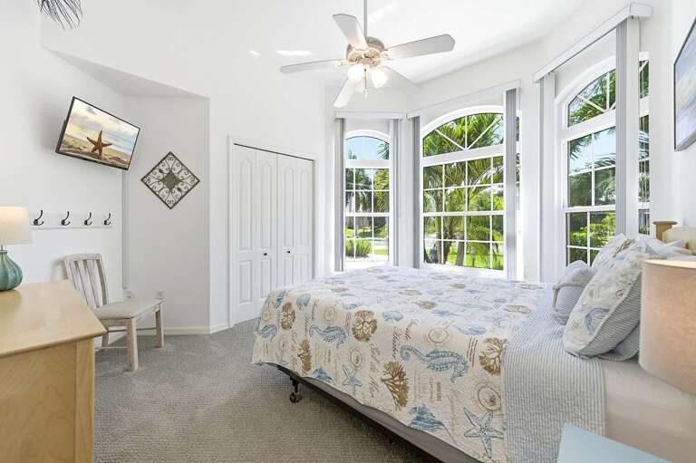 Queen Bedroom with Garden View and TV