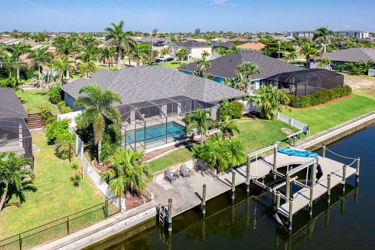 Aerial View of Flamingo House with Boat Dock/Lift and Gulf Access