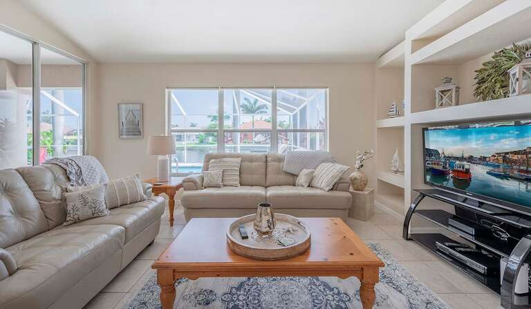 Living Room with Large TV and Comfortable Couches