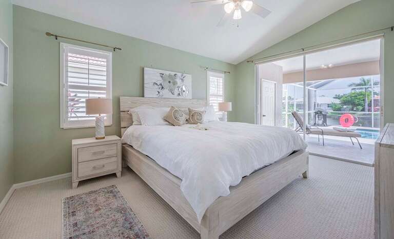 Main Bedroom Suite with King Size Bed and Direct Pool Access