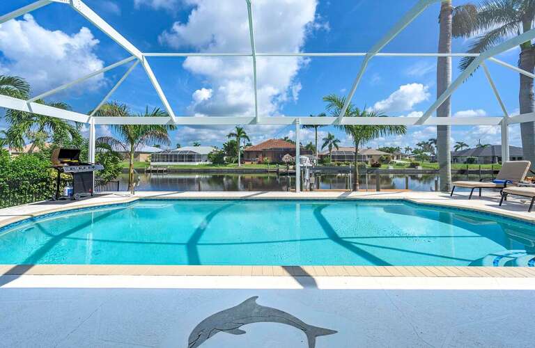Pool area with a canal view