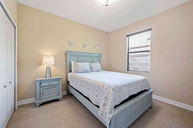 Guest Bedroom with Queen Size Bed and Garden View