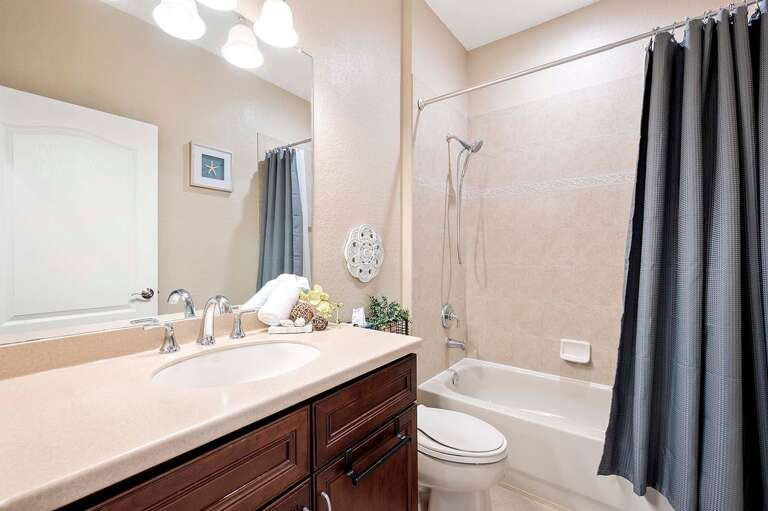 Hallway Bathroom with Shower Tub Combo and Sink
