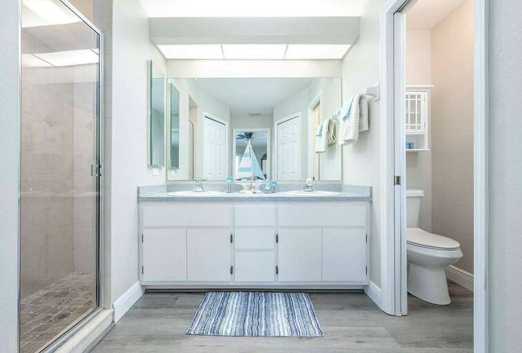 Main Bathroom with Dual Sinks and Walk in Shower