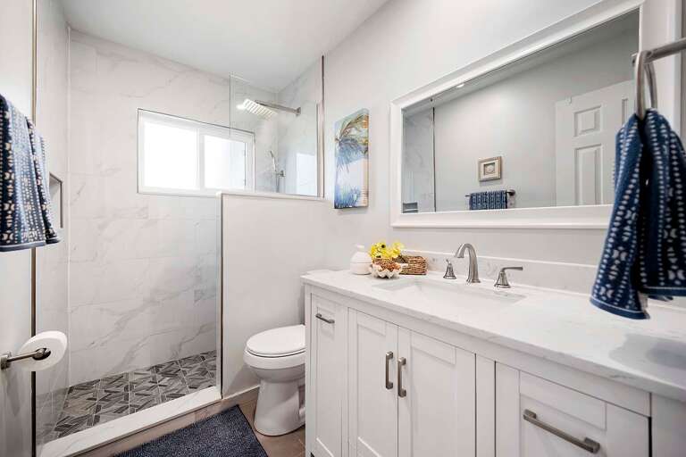 Hallway Bathroom with Shower and Sink