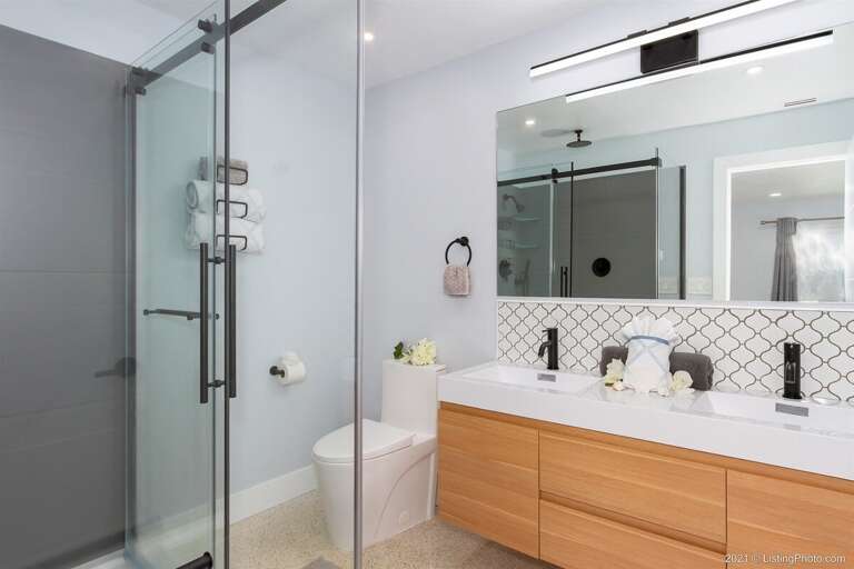 Main Bathroom with Dual Sinks and Walk in Shower