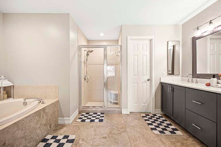 En-Suite Main Bathroom with Dual Sinks, Garden Tub and Shower