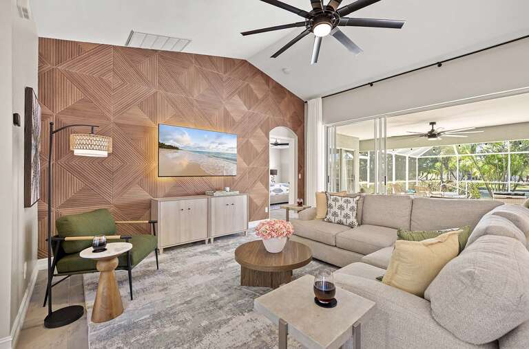 Living Room with Accent Wall and Smart TV offering Streaming Services