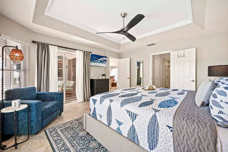 Main Bedroom with En-Suite Bathroom and Walk Out to Lanai