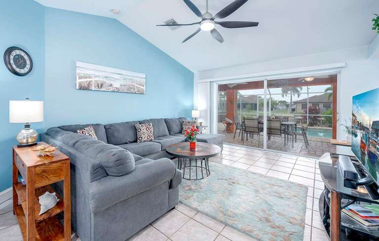 Living Room with View of Pool and Patio