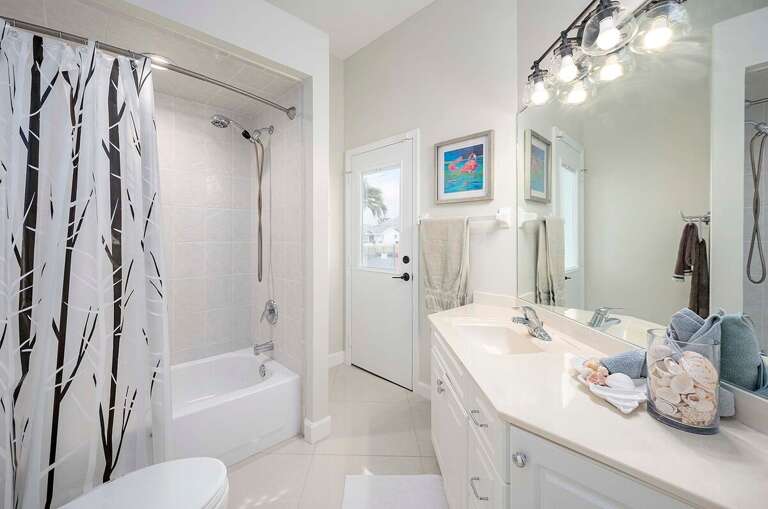 Guest Bathroom shared by Bedroom 2 and 3 and Access to Pool Area