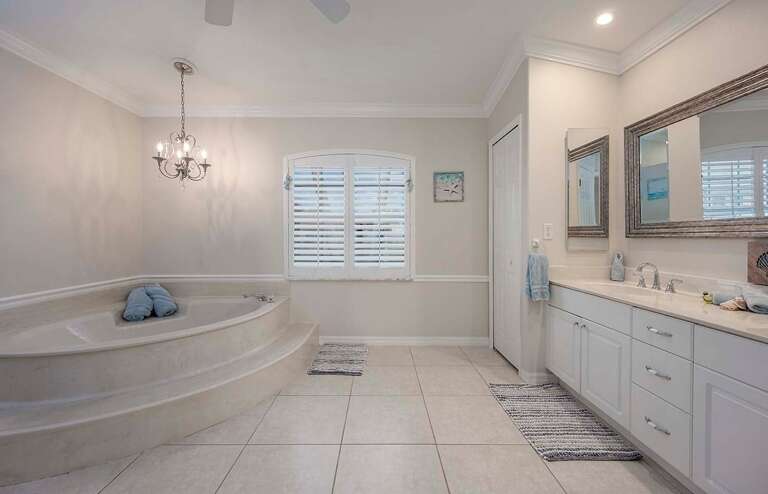 Main Bathroom with Garden Tub and Dual Sinks and Walk in Shower