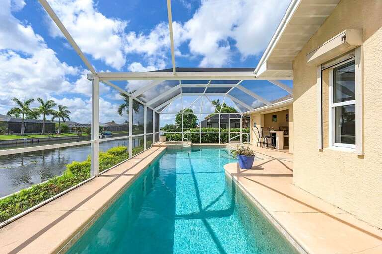 This Unique Pool has a Narrow Part for Lap Swimming as well as a Wider Part for Splashing Around