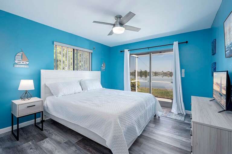 King Bedroom with Patio Access and Waterview