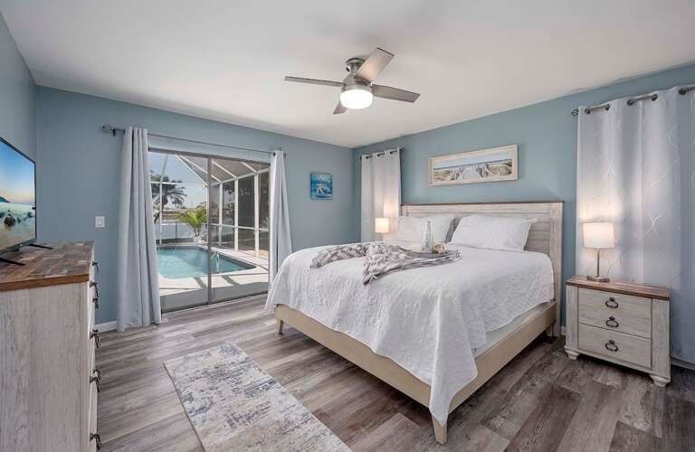 Main Bedroom with Pool Access and Waterview