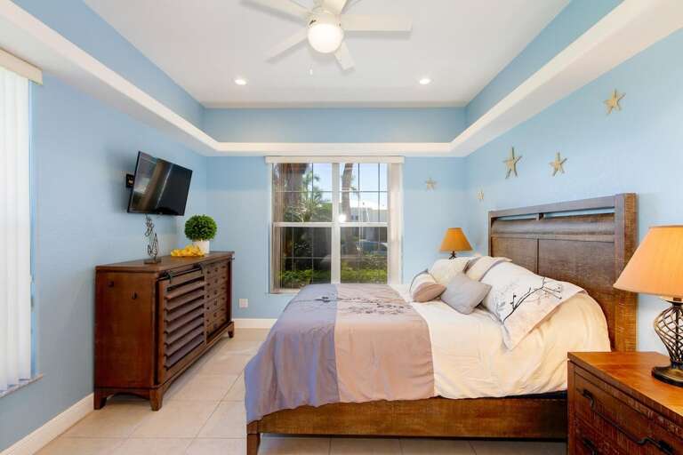 Downstairs Queen Bedroom with Garden Views and En-Suite Bathroom