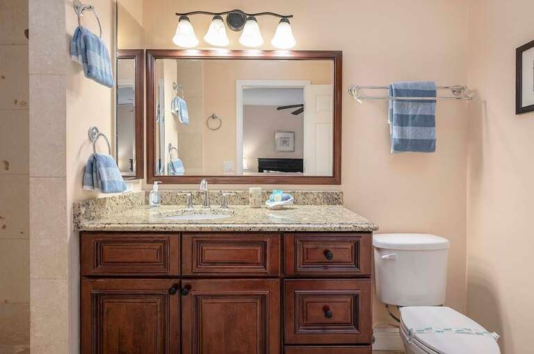 Guest Bathroom with Shower and Access to Lanai/Pool