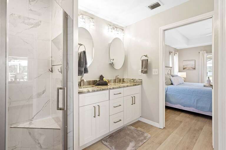 Main En-Suite Bathroom Features Dual Sinks and Shower