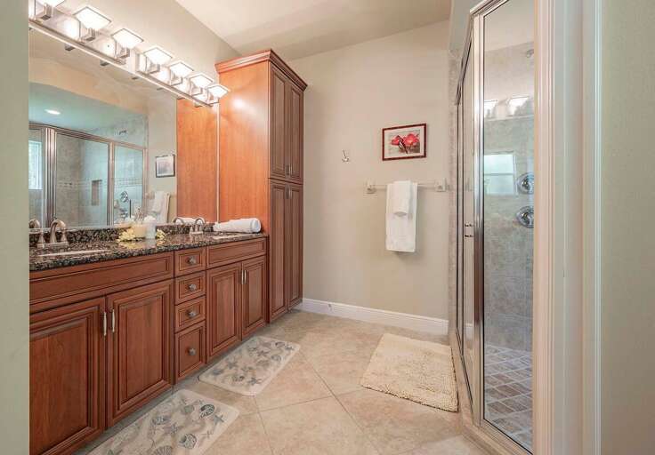En-Suite Main Bathroom with Dual Sinks and Walk in Shower