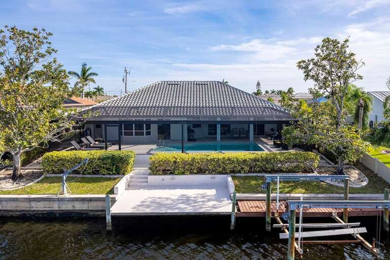 Backyard with Dock and Boat Dock/Lift