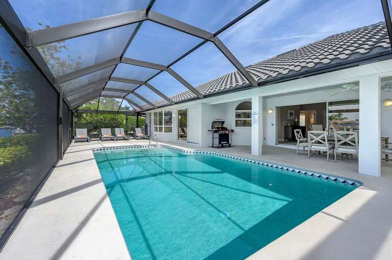 Pool Area and Lanai with Lounges, Sitting Area and Al Fresco Dining Space