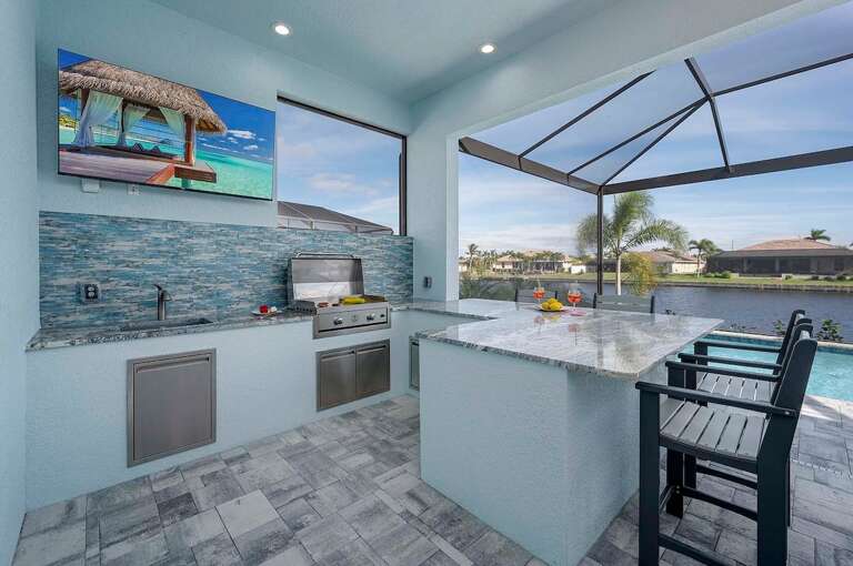Outdoor Kitchen (Built in BBQ is not available for guest) Gusts are provided with a stand alone BBQ with TV