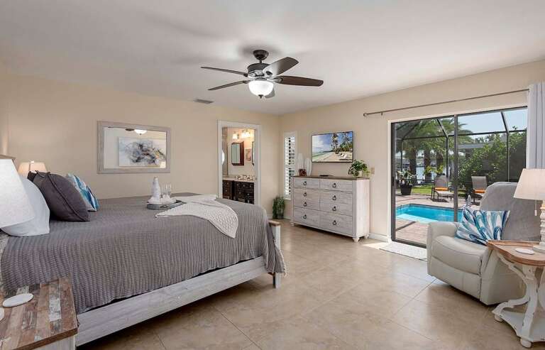 Main Bedroom with View and Access of the Pool and Patio